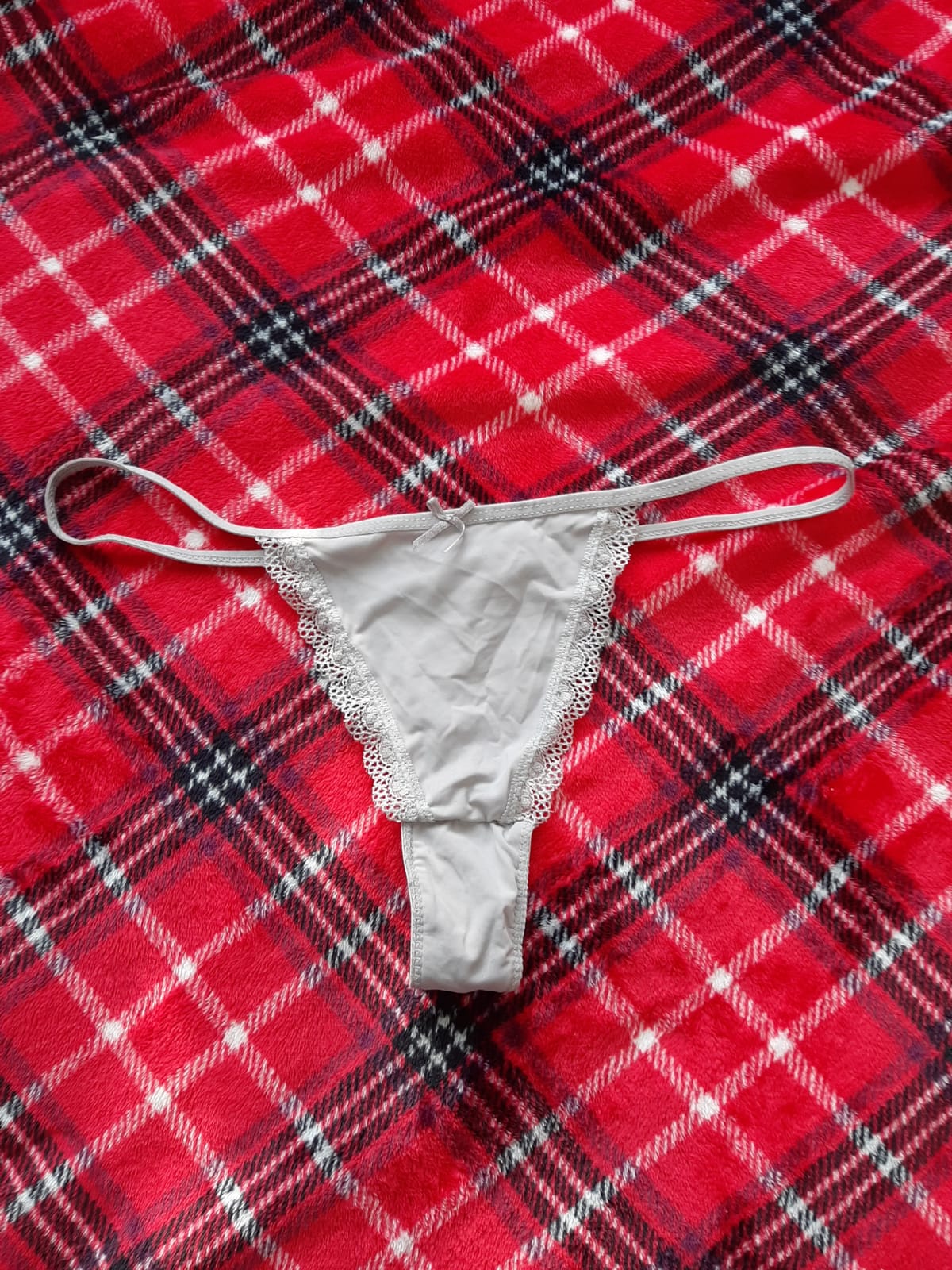Small white thin thong (used)