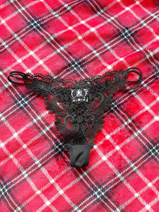Small lacey black underwear (used)